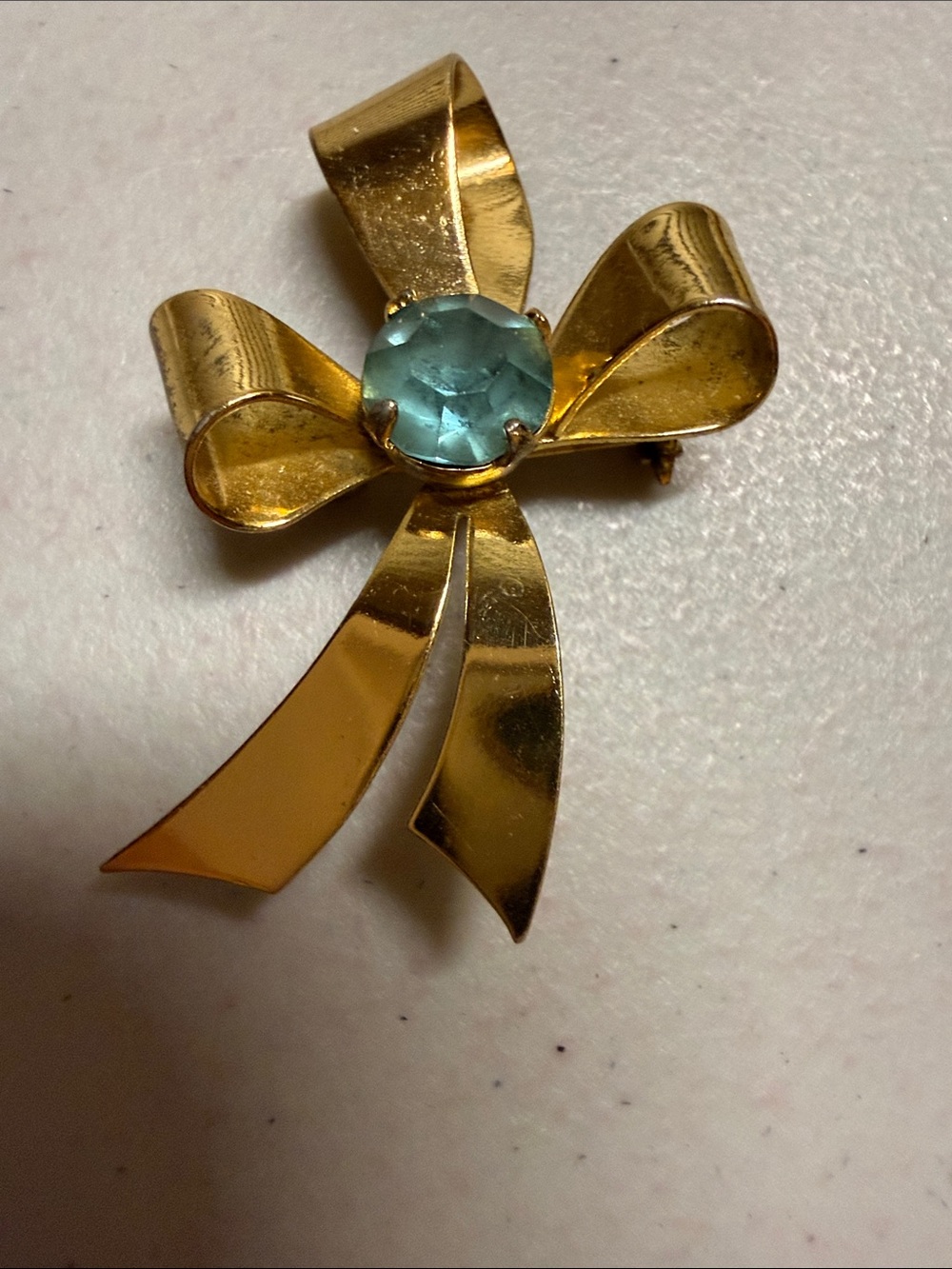 Coro Gold-Tone Bow Brooch with Aquamarine Center